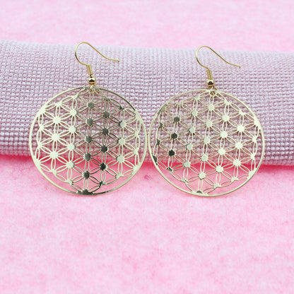 Boucles d’oreilles Fleur de Vie dorées sur fond rose – Caelvero